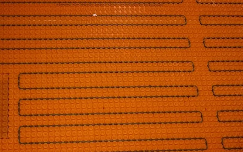Electric in-floor heating cable installed under bathroom tile in a GTA home by Made Electric